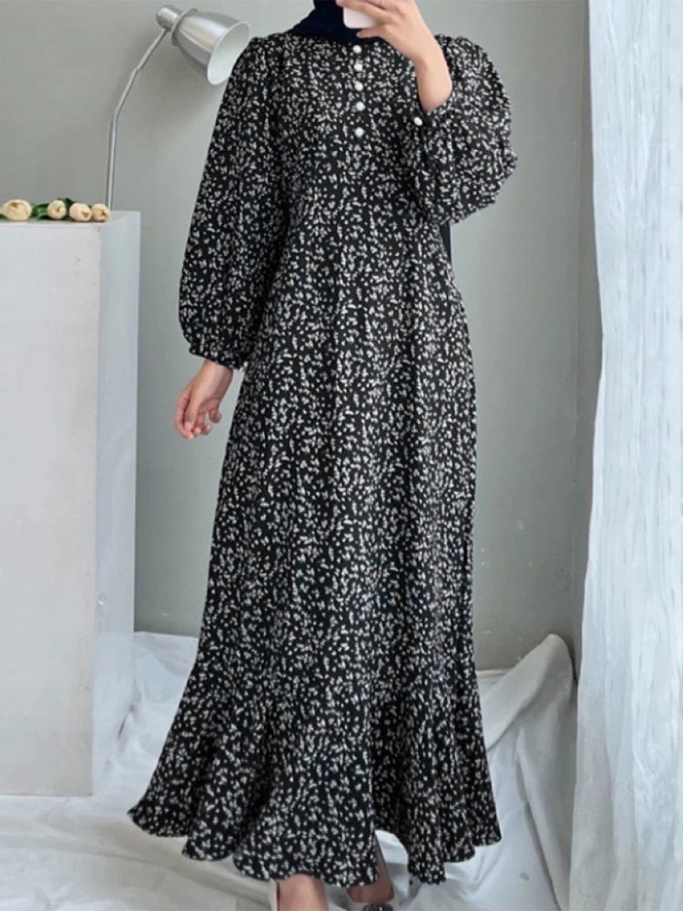 Robe Hind noire — vue de face, silhouette longue fluide avec imprimé fleuri