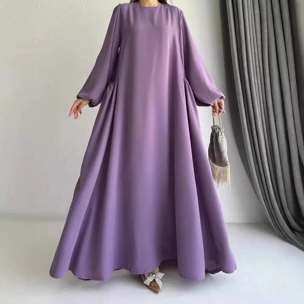 Robe Sirine — détail des fleurs appliquées et drape fluide