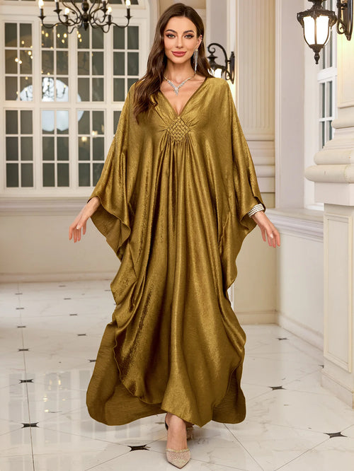 Kaftan Dalia doré — détail des manches papillon larges et du tombé fluide