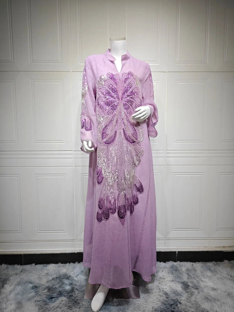 Robe Meryem pailletée — vue de face, silhouette fluide et longue