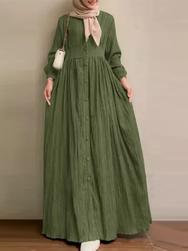 Robe Selma — détail du boutonnage recouvert et de l'encolure ronde